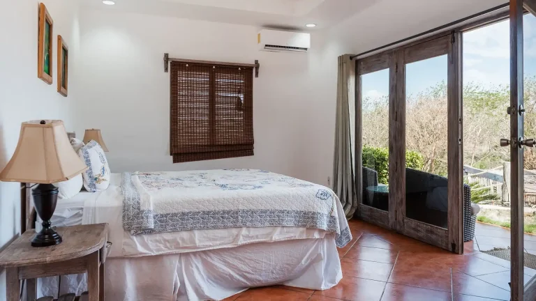 La Jolla de Guasacate, hilltop boutique hotel in Popoyo, Nicaragua – King Standard with Pool View room with king bed and patio doors