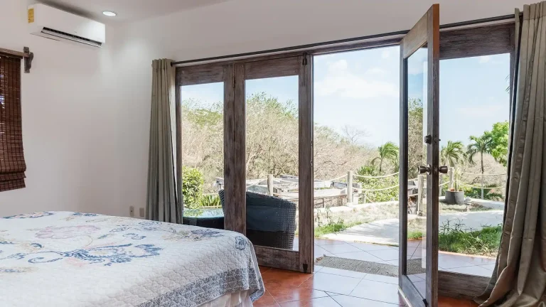 La Jolla de Guasacate, hilltop boutique hotel in Popoyo, Nicaragua – King Standard with Pool View room with doors to a private balcony